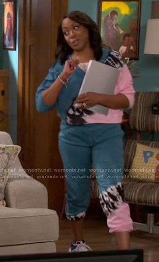 Tina's tie dye sweatshirt and joggers on The Neighborhood