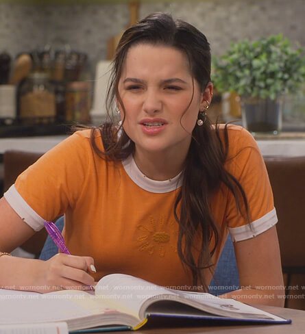 Lex's orange floral embroidered ringer tee on Side Hustle