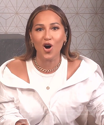 Adrienne's white layered blouse on The Real
