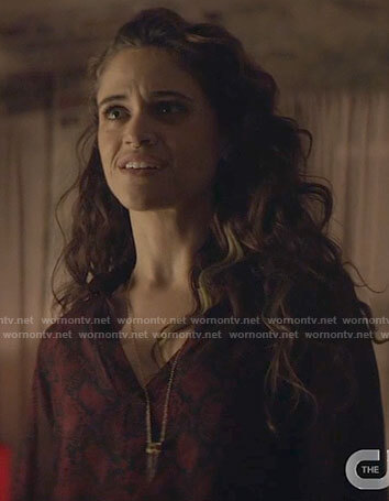 Angelique's red snake print blouse on Batwoman