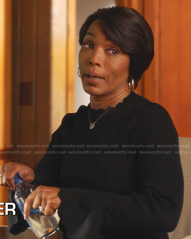 Athena's black ribbed scalloped sweater on 9-1-1