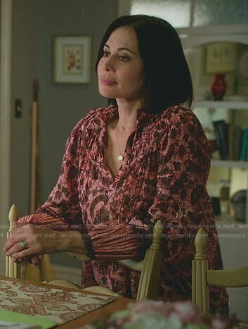 Cassie's pink metallic printed blouse on Good Witch