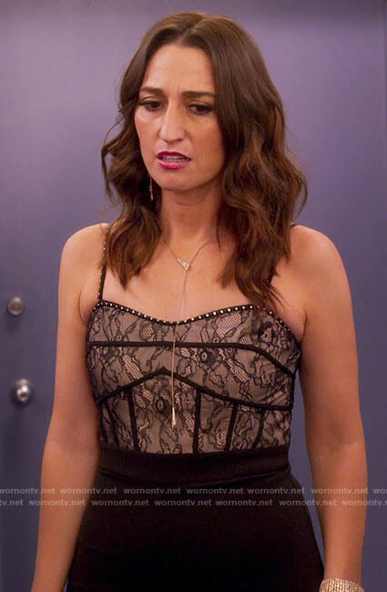 Dawn's black lace jumpsuit on Girls5eva