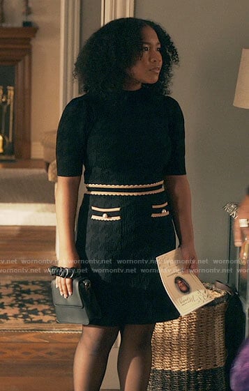 Delilah's black houndstooth dress with pearl buttoned pockets on The Equalizer