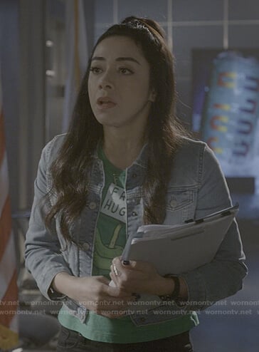 Ella's green Free Hugsss print tee on Lucifer