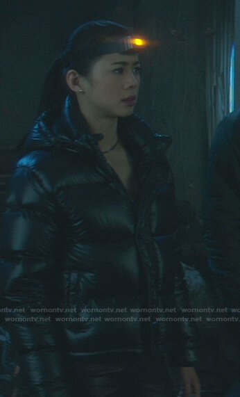 George's black hooded puffer jacket on Nancy Drew