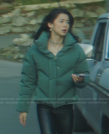 George's green puffer jacket on Nancy Drew