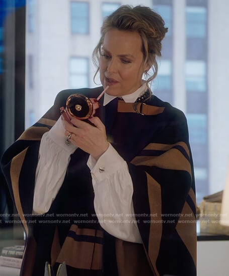Jacqueline's blue buckle detail cape on The Bold Type