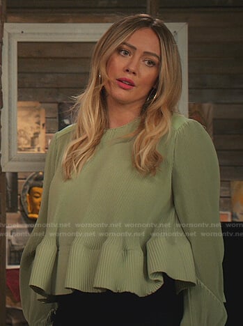 Kelsey's green pleated peplum top on Younger