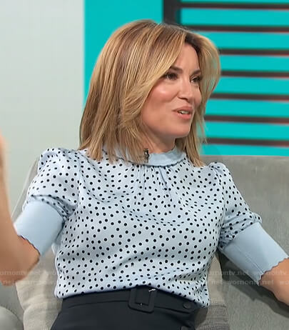 Kit's light blue polka dot top on Access Hollywood