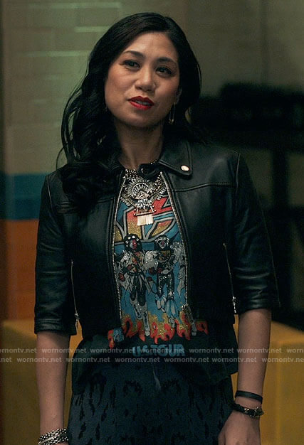 Mel's KISS shirt and cropped leather jacket on The Equalizer