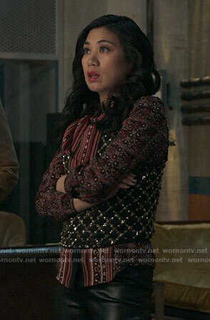 Mel's pink printed blouse and studded top on The Equalizer