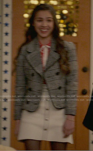 Nini's plaid jacket, heart print shirt and white skirt on High School Musical The Musical The Series