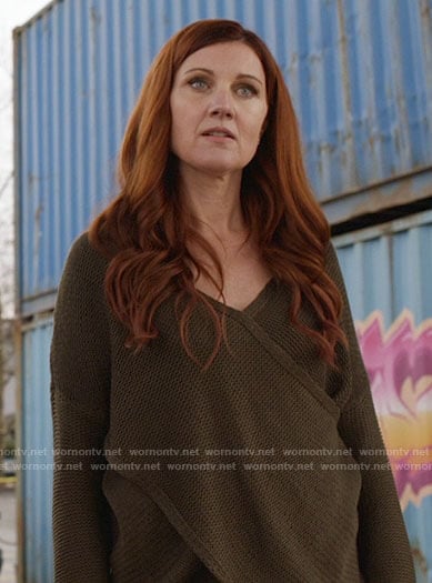 Nora's olive green crossover sweater on The Flash