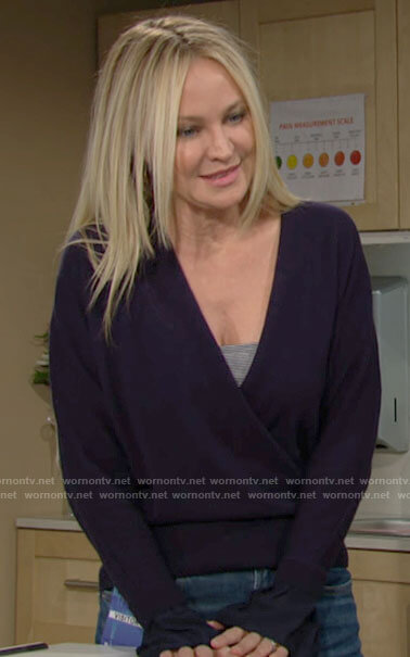Sharon's navy wrap front sweater on The Young and the Restless