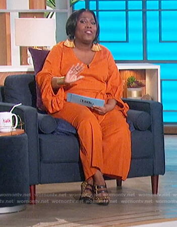 Sheryl's orange wrap jumpsuit on The Talk