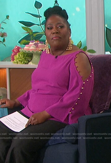 Sheryl's pink button sleeve top on The Talk
