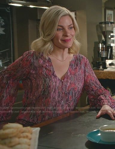 Stephanie's pink printed wrap top on Good Witch