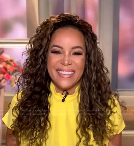 Sunny Hostin's yellow pleated top on Good Morning America