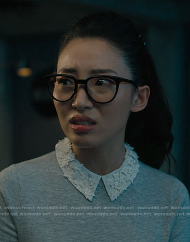 Swan's grey sweater with white floral collar on Charmed