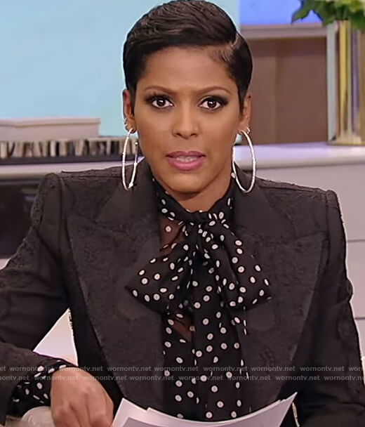 Tamron's black polka dot blouse and blazer on Tamron Hall Show
