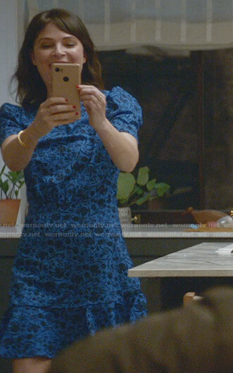 Taylor's blue floral ruffle hem dress on Bull