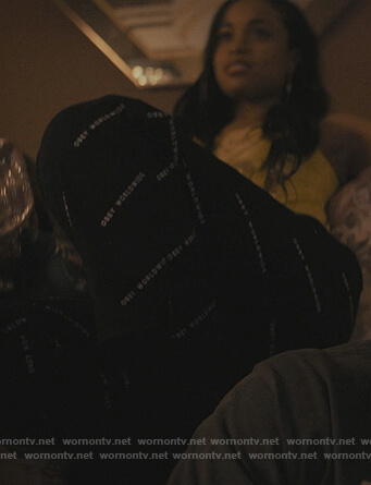 Tiff's black Obey logo pants on The Chi