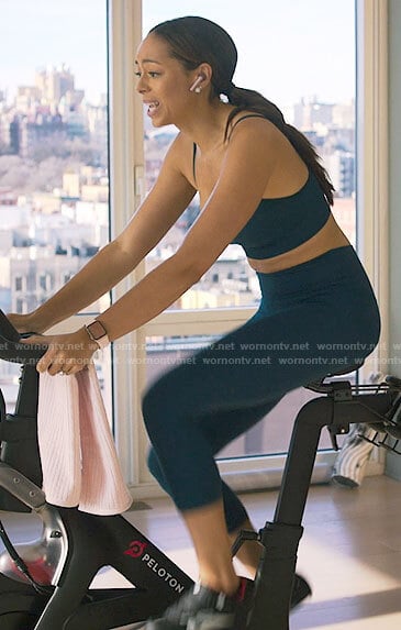 Whitney's teal leggings and sports bra on Run the World