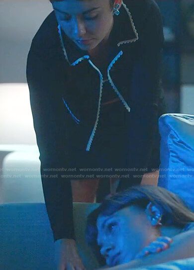 Ari's black scalloped cropped top and jacket on Elite