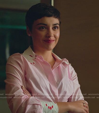 Ari's pink hand embroidered shirt on Elite