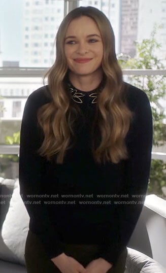 Caitlin's navy studded collar sweater on The Flash