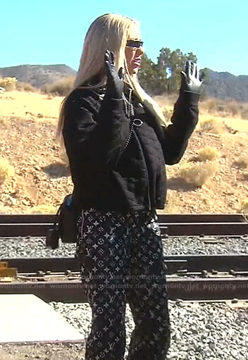 Dorit's black quilted jacket and monogram pants on The Real Housewives of Beverly Hills