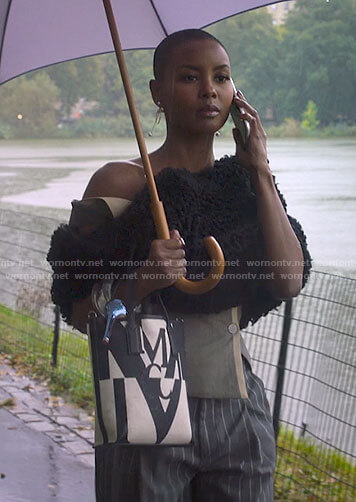 Ella's fur shrug and off-shoulder top on Run the World
