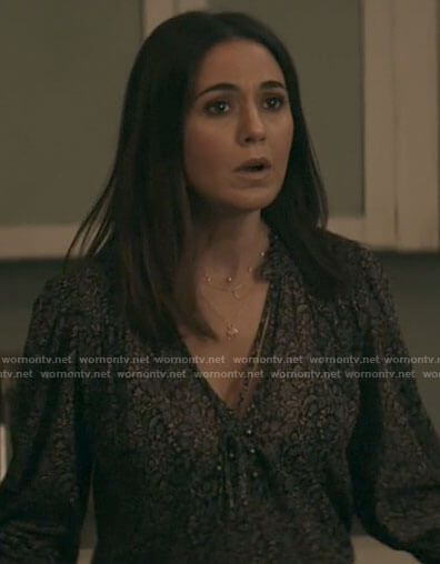 Lana's dark floral blouse on Superman and Lois