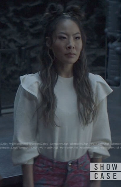 Mary's white ruffled shoulder sweater on Batwoman