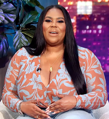 Nina's floral print bodysuit on E! News Nightly Pop