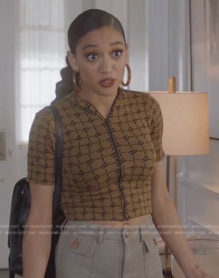 Olivia's brown printed zip top on All American