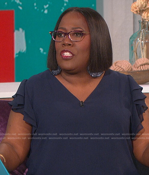 Sheryl's blue ruffle sleeve top on The Talk