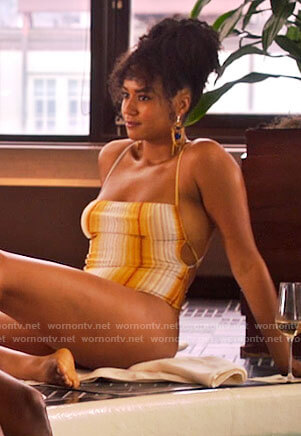 Sondi's yellow striped swimsuit on Run the World