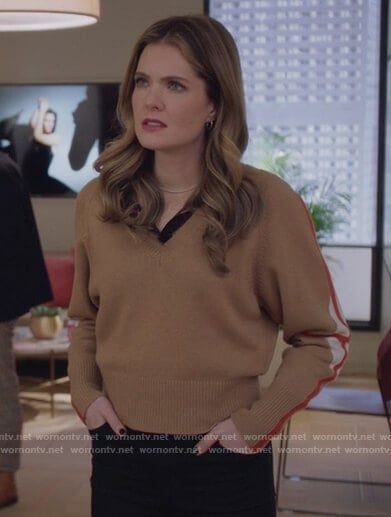 Sutton's beige stripe sleeve sweater on The Bold Type