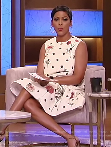 Tamron's white sleeveless floral dress on Tamron Hall Show