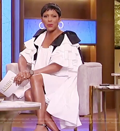 Tamron's white contrast tie sleeve dress on Tamron Hall Show