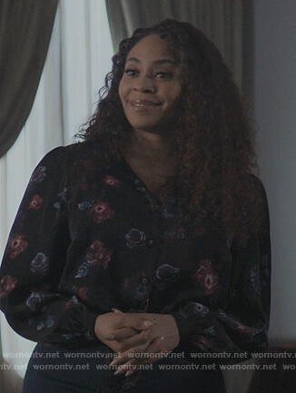 Tracy's black floral print blouse on The Chi