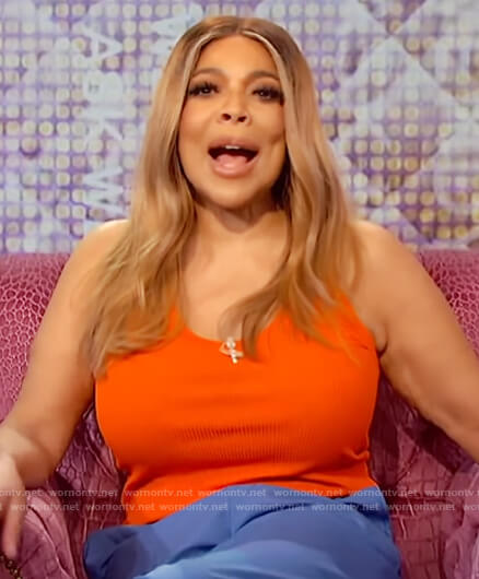 Wendy's orange tank and blue pants on The Wendy Williams Show