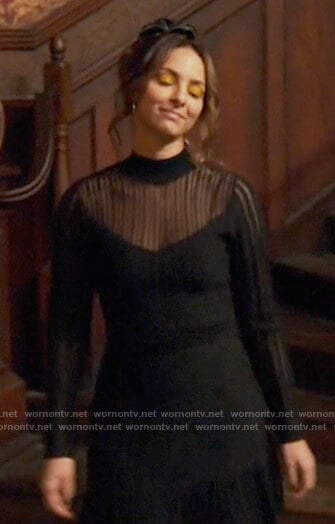 Zari's black mesh striped dress on Legends of Tomorrow