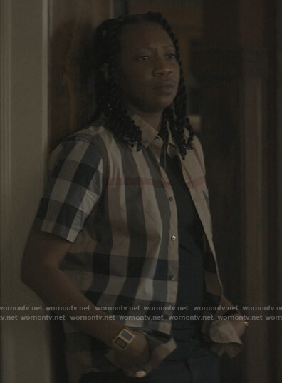 Dre's beige plaid shirt on The Chi