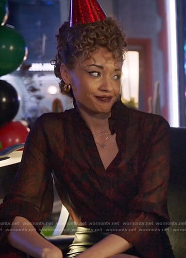 Astra's red snake print blouse on Legends of Tomorrow