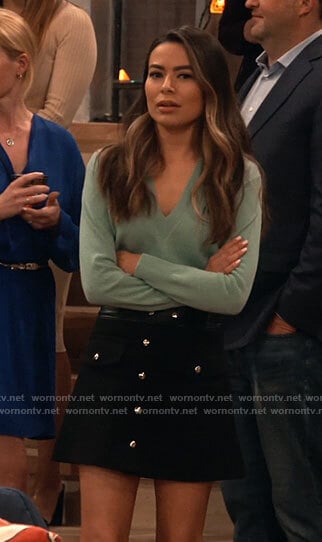 Carly's green pointelle v-neck sweater and black button front skirt on iCarly