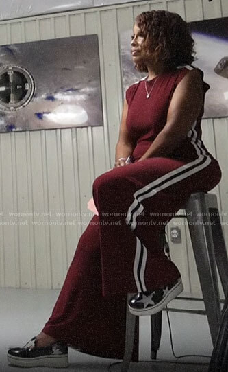 Gayle King's red side stripe jumpsuit in Jeff Bezos interview on CBS This Morning