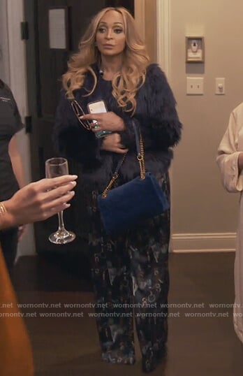 Karen's blue belt print jumpsuit on The Real Housewives of Potomac